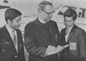 Los Changuitos Feos 2nd generation group members Robert Gastellum & Robert Martinez with Fr Butler. First trip to Disneyland - 1969